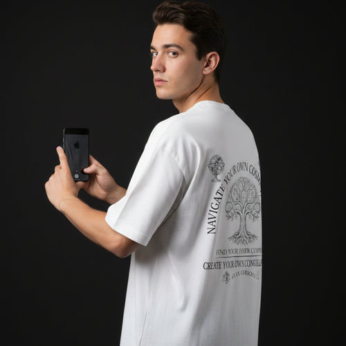 White t-shirt with cosmic journey design on a white background
