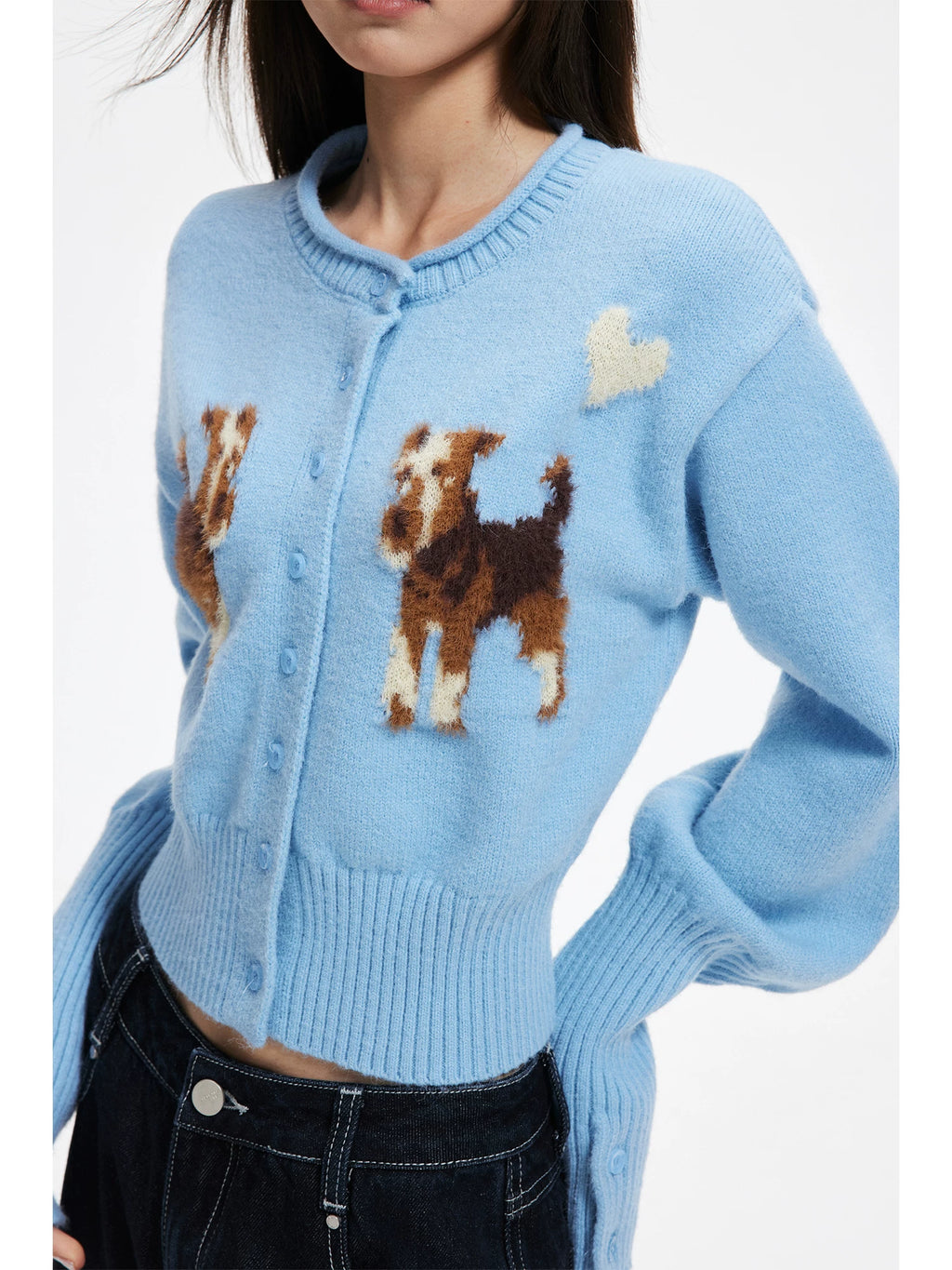 APEA's cozy puppy jacquard knit cardigan in a cropped, waist-cinching silhouette — an effortlessly chic layering piece for fall and winter.