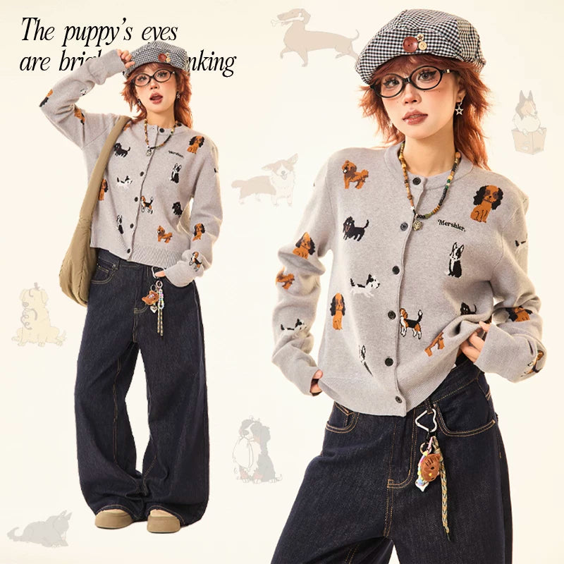 Adorable grey knit cardigan featuring a charming puppy print design. This cropped style offers a playful, contemporary look perfect for casual outings or layering. Crafted from soft, comfortable knit fabric that moves with you throughout the day. The cropped length pairs effortlessly with high-waisted bottoms for a modern silhouette. Ideal for animal lovers seeking a cozy yet stylish piece to add to their wardrobe.